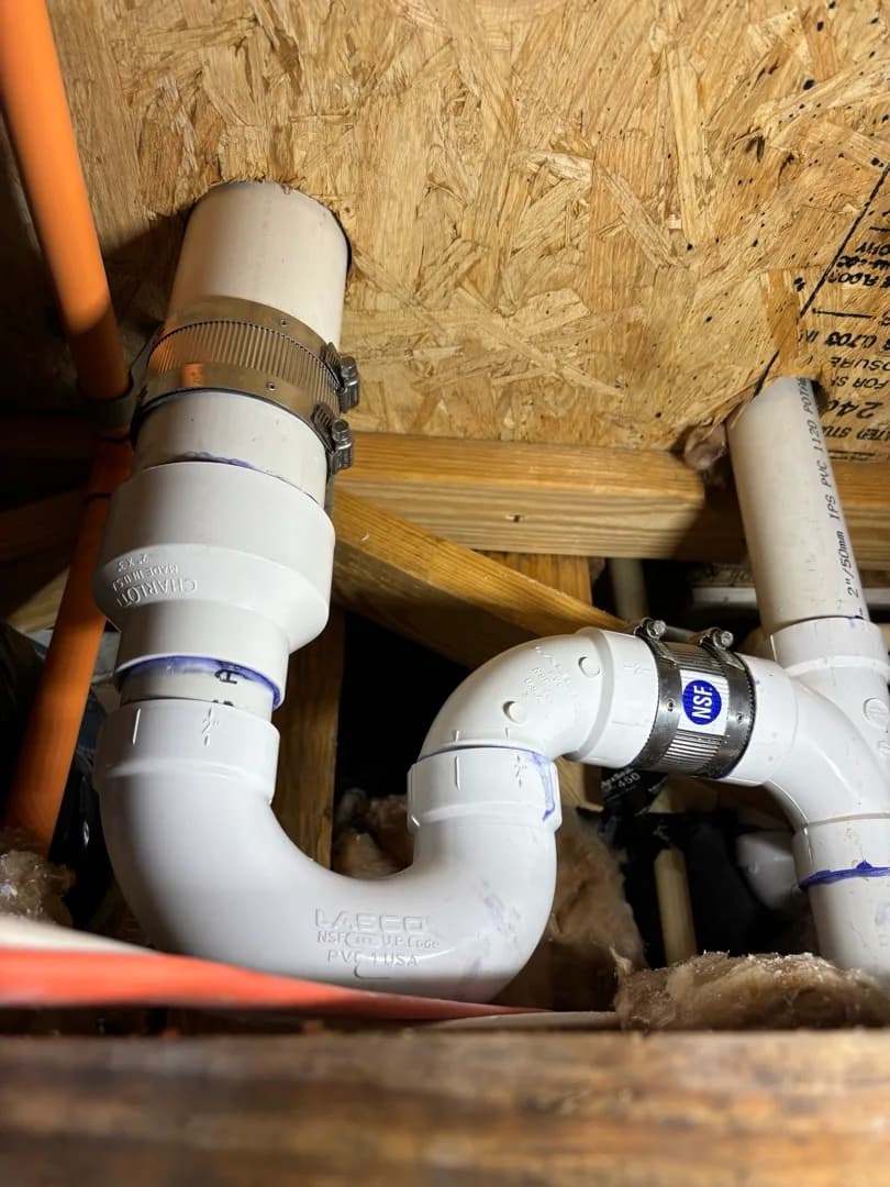 Broken PVC Drain Pipe in the Floor of a Durham Home