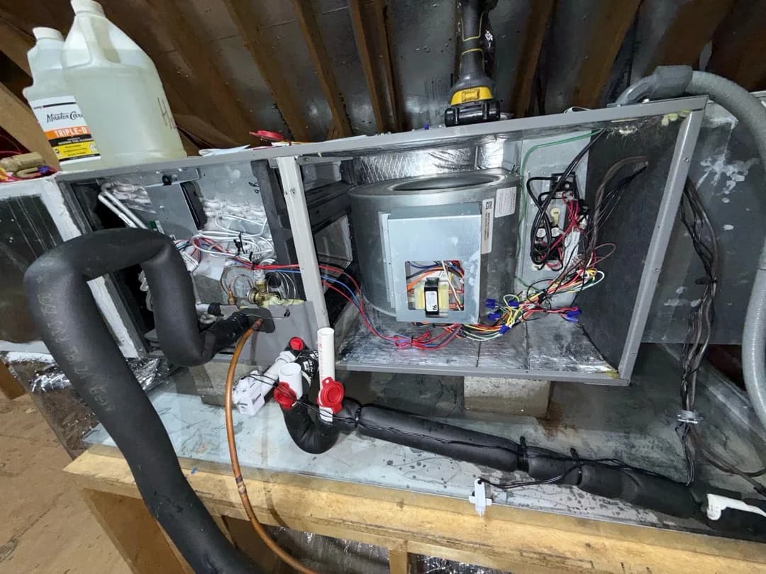 What Caused an Attic AC Leak Into the Bathroom in Cary?