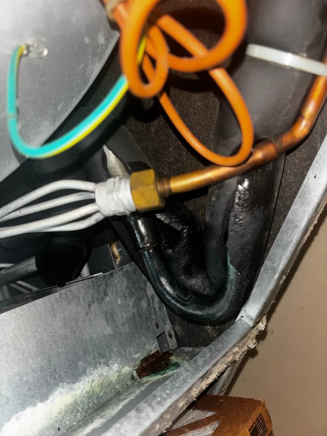 Oil Coming Out of the AC Pipe in a Raleigh Apartment